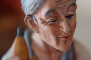 Basket Weaver Figurine 